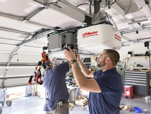 Bedford Garage Door Repair technician performing advanced diagnostics on garage opener in Bedford
