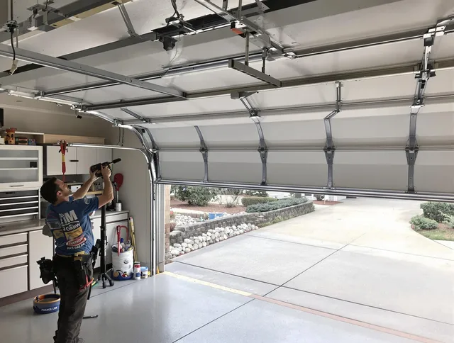Garage door track repair service by Bedford Garage Door Repair in Bedford